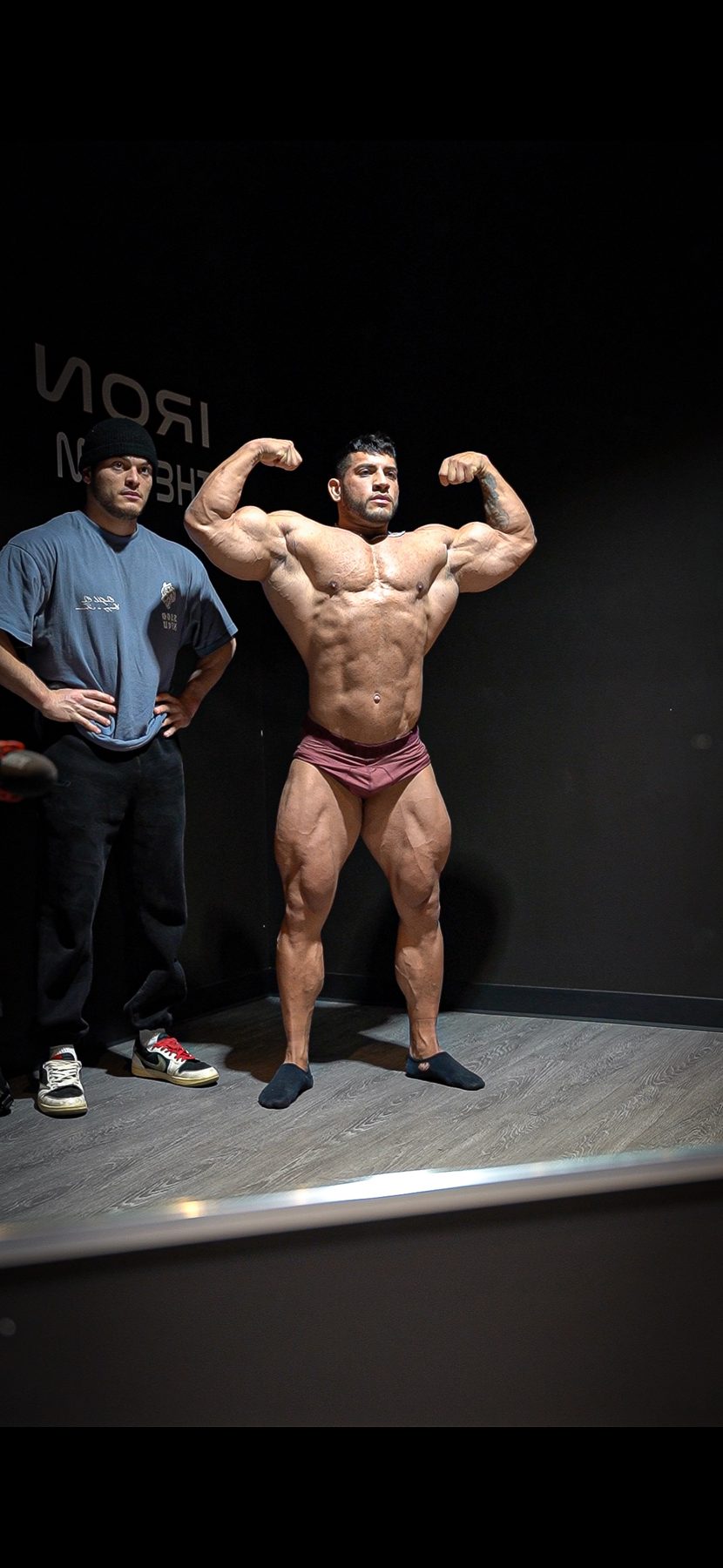 Front double biceps check backstage